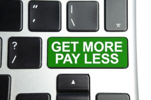 Tangentbord med texten get more pay less